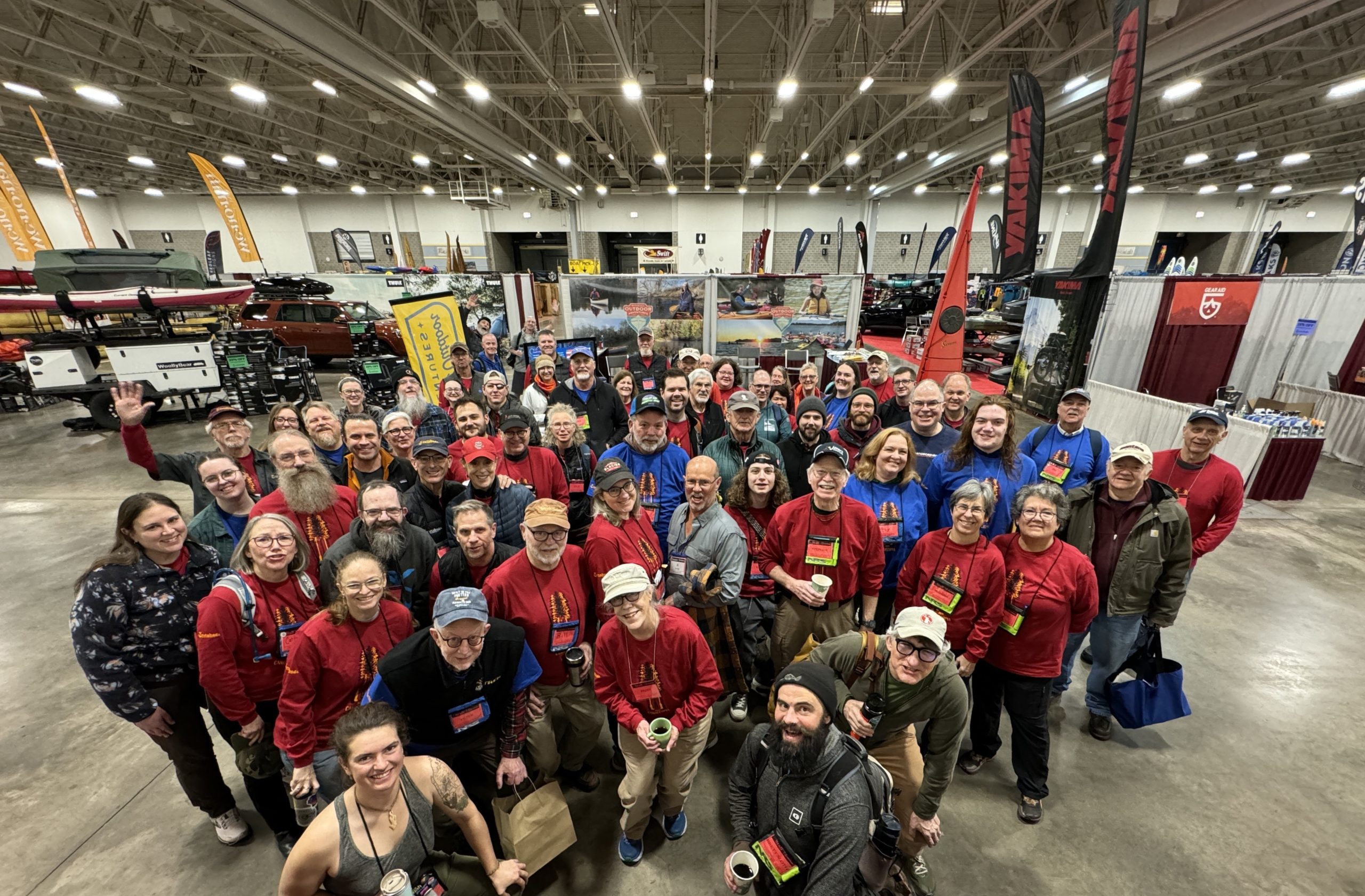 Group of Rutabaga employees ready to open the vendor hall of Canoecopia