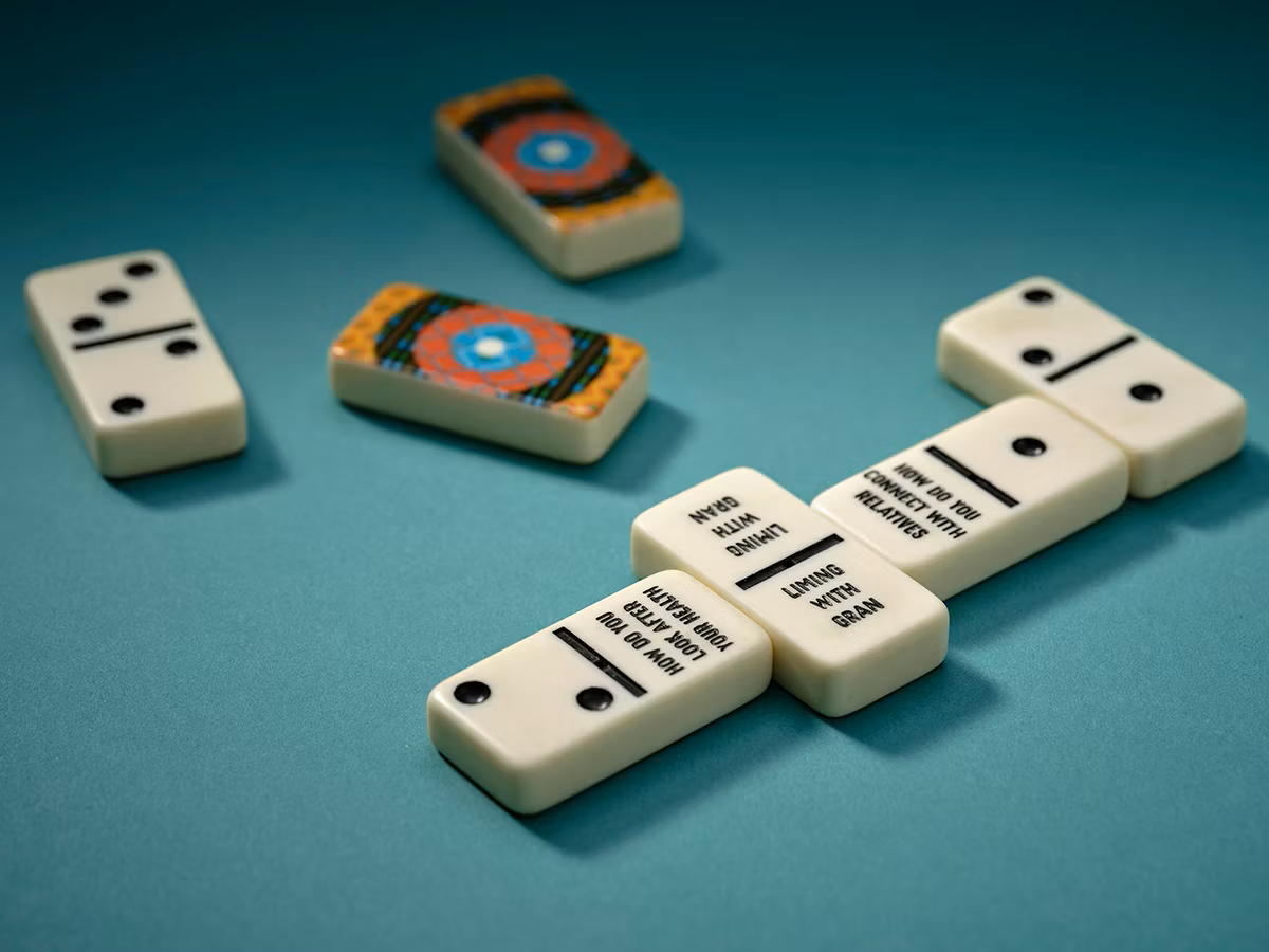 Special dominoes with messages like "Liming with Gran" and "How do you look after your health."